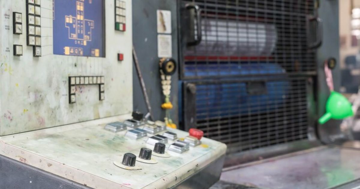 Control panel of a hydraulic CNC press brake machine in an industrial setting